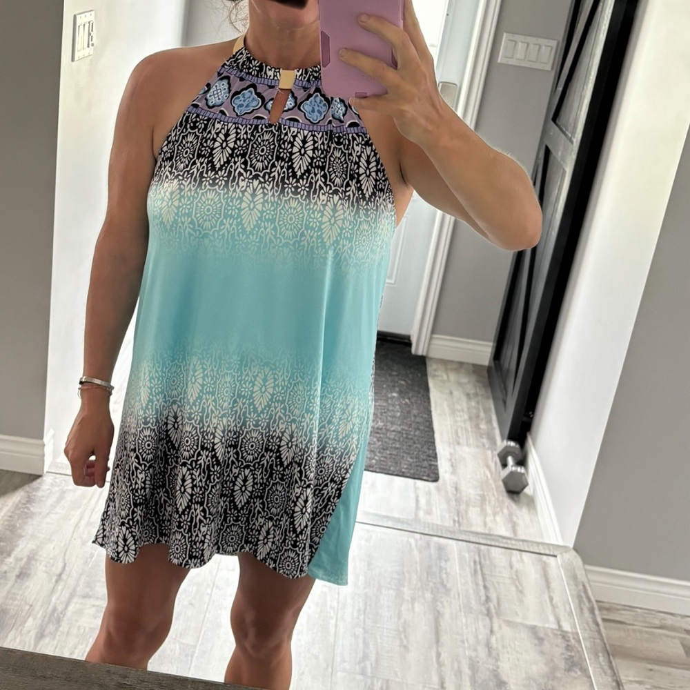 Summer fling dress. Can be worn casually or dressy , new without tags.